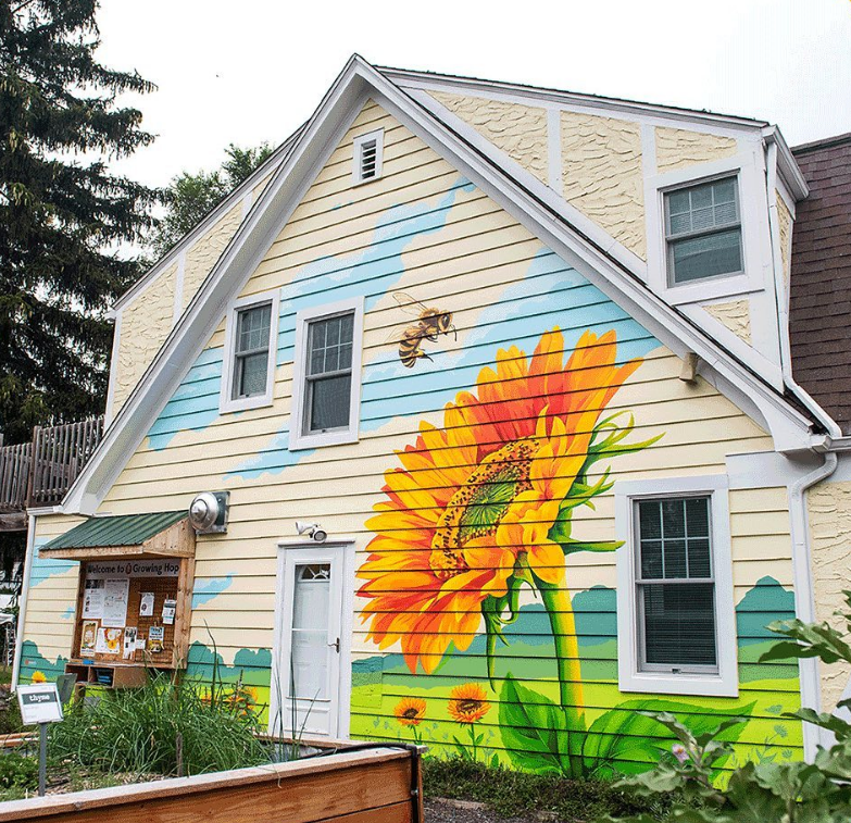 ypsireal's tweet photo. New artwork in #Ypsilanti at @growingthehope! 🌻 Painted by @TreeTownMurals, and part of a collab featuring new art in both Ypsilanti and #AnnArbor. 🎨 See its sister mural by community member Yen Azzaro at @ArgusFarmStop! 🖌 @A2ArtCenter 📷: Andrew Cohen
#Ypsi #A2AC #a2acmurals https://t.co/wrOSbWRETs