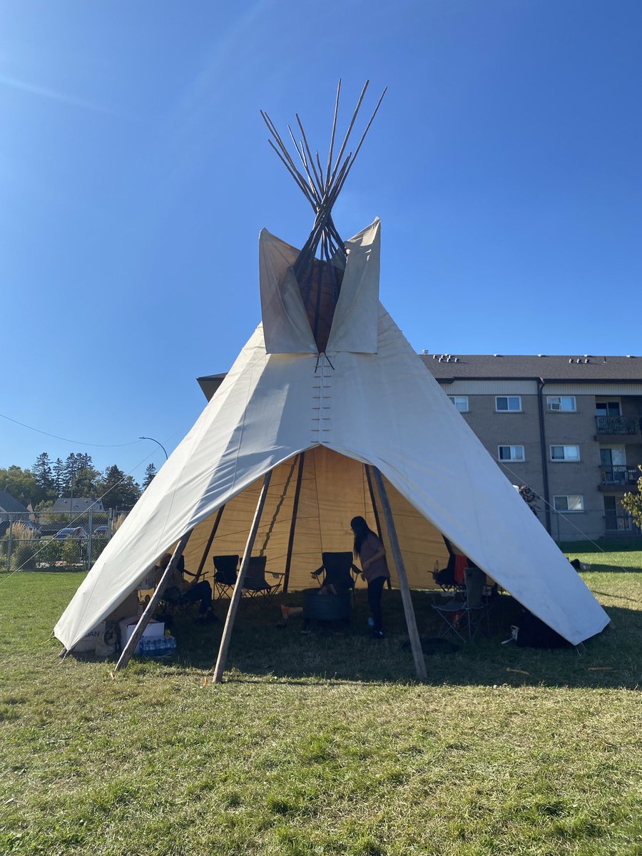 TanyaTalaga's tweet photo. Sacred fire is lit at the site of the former St. Joseph’s Indian Residential School. The site is now the playground of the Pope John Paul II Elementary School in Thunder Bay. The @NANComms tipi is here and the fire will stay lit until and on Sept. 30. #allourrelations https://t.co/OSrsuMFooI