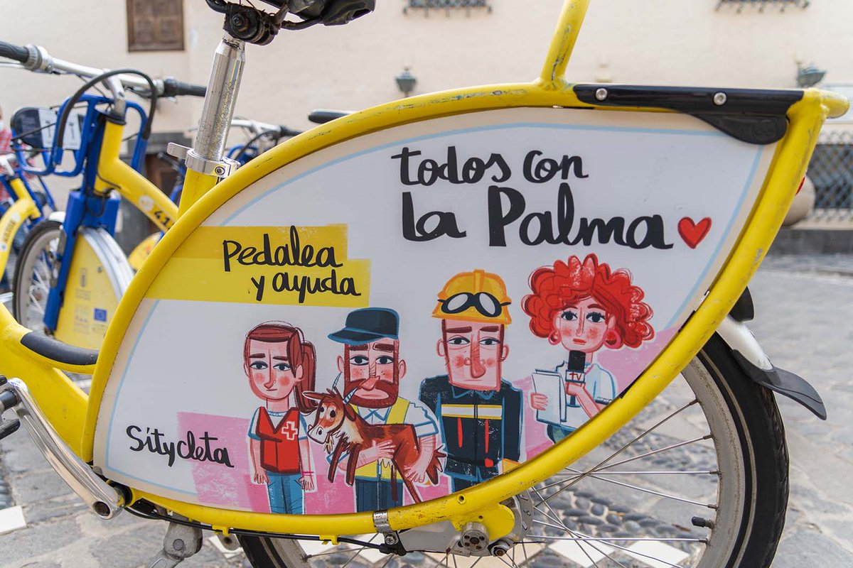 💚 A través de la #MovilidadSostenible también puedes ayudar a #LaPalma 👉 Mediante la iniciativa 'Pedalea por La Palma' transformaremos en euros todos los kilómetros que los usuarios realicen, durante 6 meses, en las @sitycleta con la imagen cedida por el artista <a href="/VictorJaubert/">Víctor Jaubert</a>