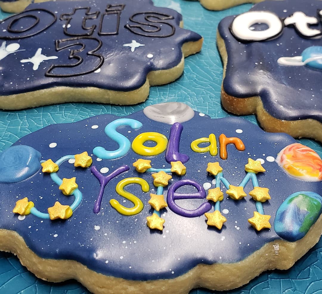 A few Solar System cookies for a 3 year old who's loving the planets and stars.