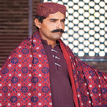 Sindhi Topi is traditionally worn with Ajrak, which is a unique form of block-printing found in Sindh-Pakistan. We should appreciate other cultures instead of renaming them. After Chitrali Topi aka Pakol now