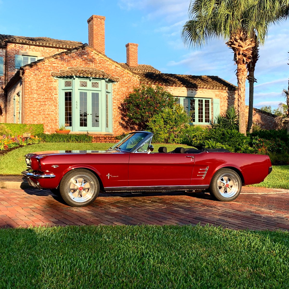 Isn’t she lovely? 
⁡
This is a 1966 #Mustang convertible in Vintage #Burgundy Metallic having its #Revology graduation photos taken.  The soft morning light makes it look even more glamorous and we can’t wait to share more photos! Stay tuned.