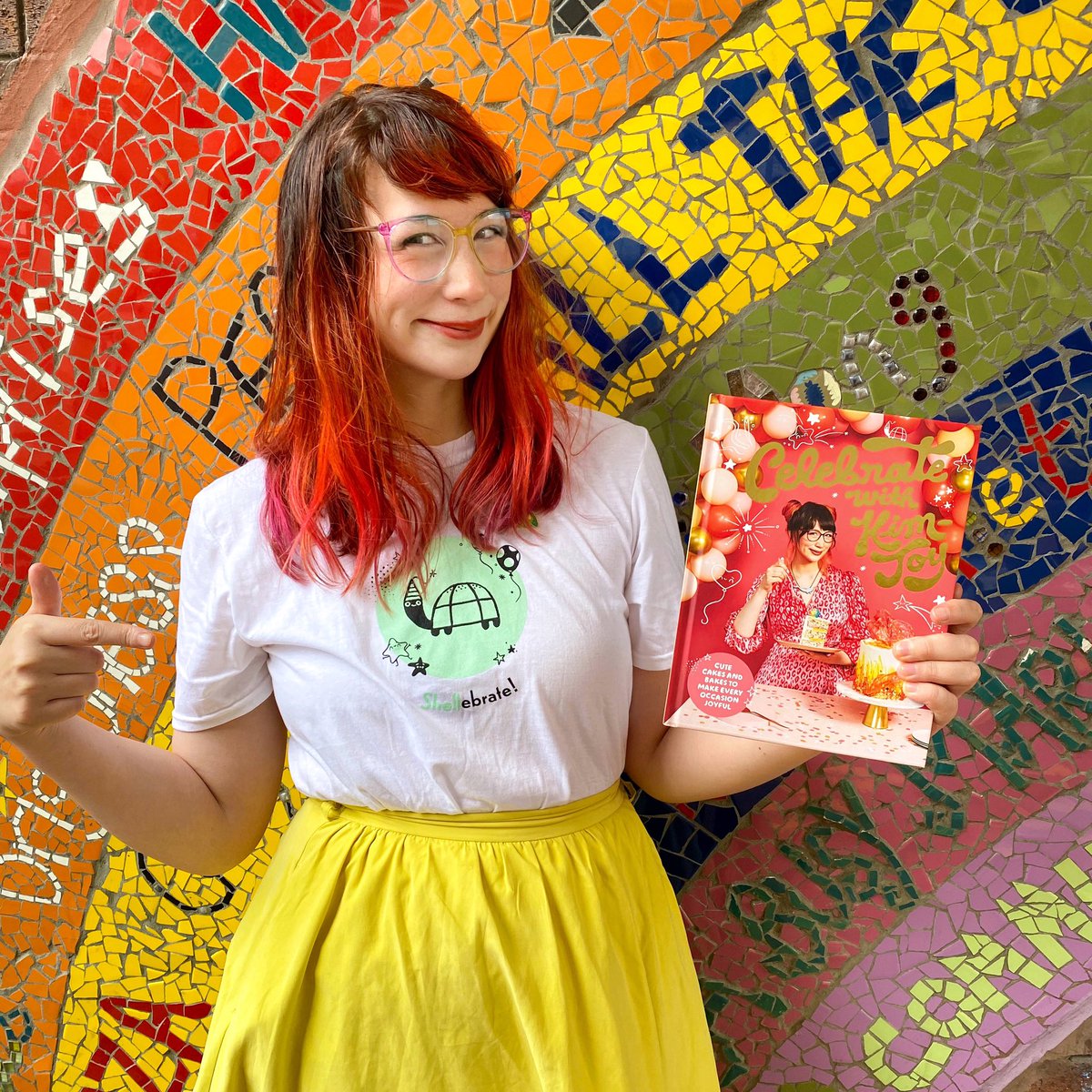 My new book ‘Celebrate with Kim-Joy is out this THURSDAY!! 😱 To celebrate (🤪) I’m doing a giveaway! Retweet to win one of 8 of these ‘shellebrate’ tshirts, and for one winner I’ll pop the book along in the post too, cause I’m feeling happy📚🥰 you have til Thursday!!!👍