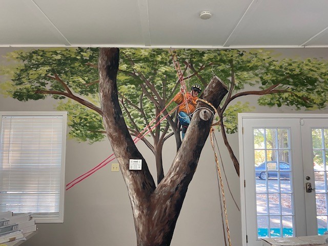 BranchOutATL's tweet photo. We recently gave one of our buildings a makeover! We had the amazing TJ Artworks paint these fun murals for us over at the Orchard. We love that the murals are based off photos of our team members climbing, and really adds some character to the space. https://t.co/wVx2OzVTH2