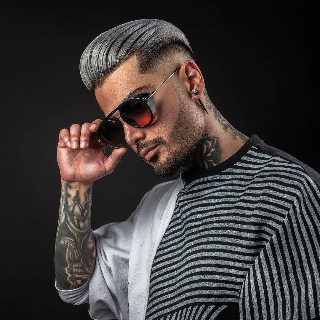 15 Best Slicked Back Undercut Hairstyles for Men in 2019  All Things Hair  US