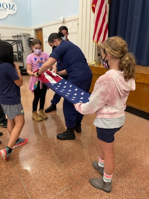 Thank you to our wonderful Coast Guard volunteers who helped our 4th grade leaders learn about our flag and how to treat it with respect!