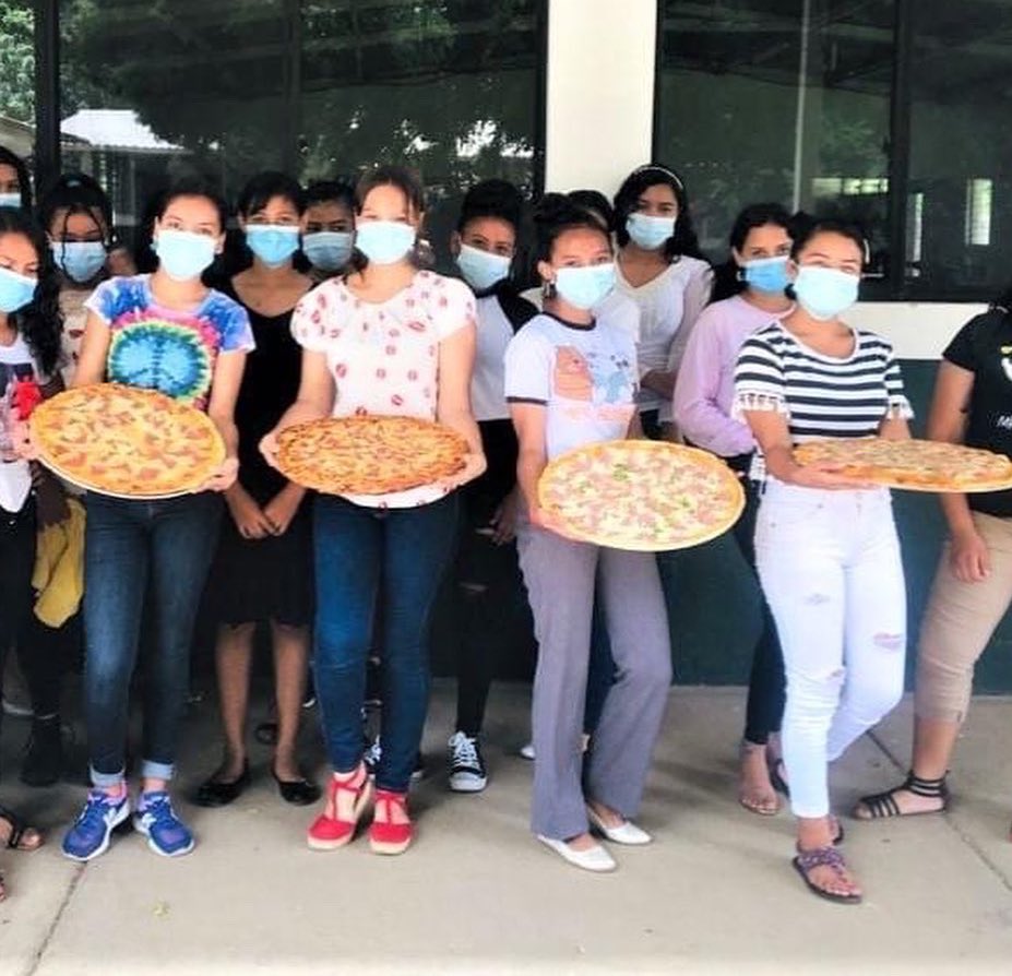 LifeLinkInt's tweet photo. The Pearls learning to make homemade pizza with Profe Wendy at the LifeLink kitchen. Yumminess is definitely a skill and a fun part of the girl’s #discipleship group. 
#pizza #girlslearn #yummy #lifelinkint #fun https://t.co/AEGyLjgJ79