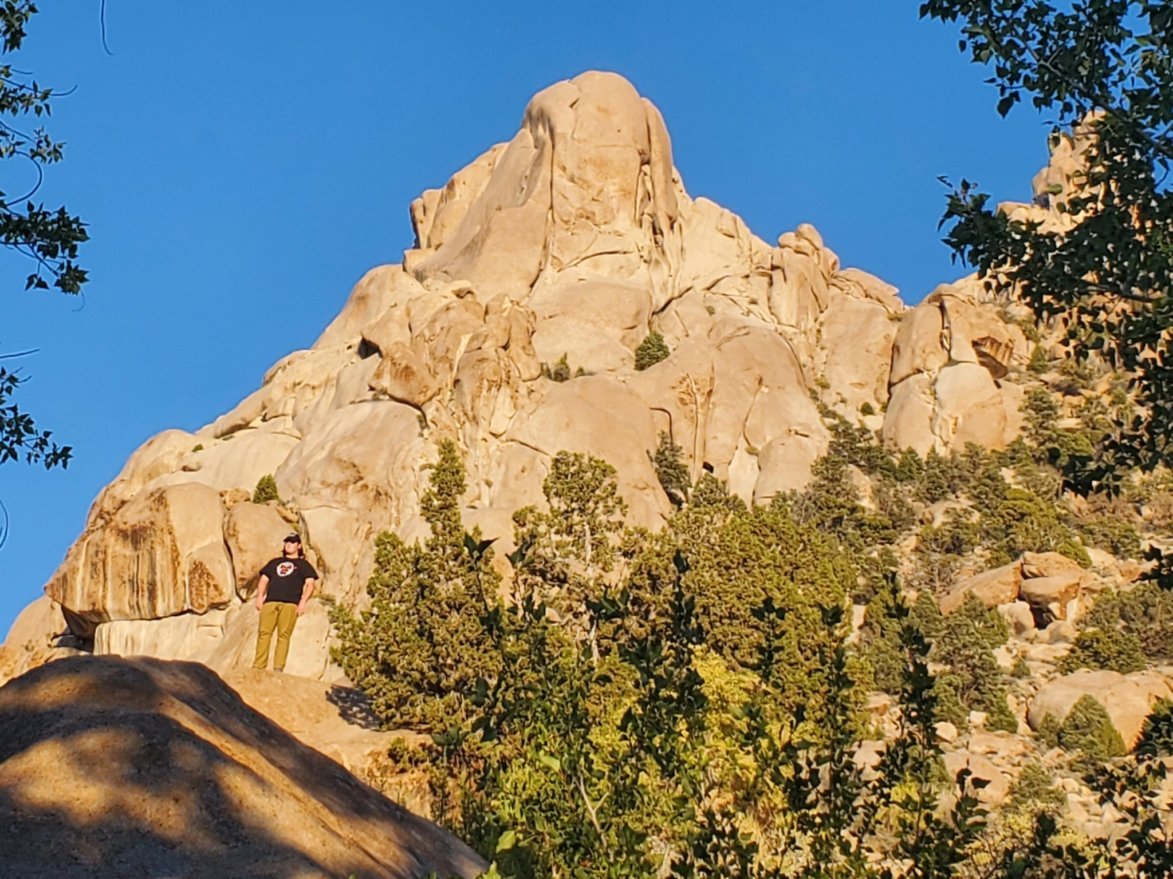 maxroth's tweet photo. My son posing majestically in the House Mountains, Western Utah. Beautiful, isolated, and uncrowded, unless you count flies. But hey, can't have everything. https://t.co/FLsEidw3to