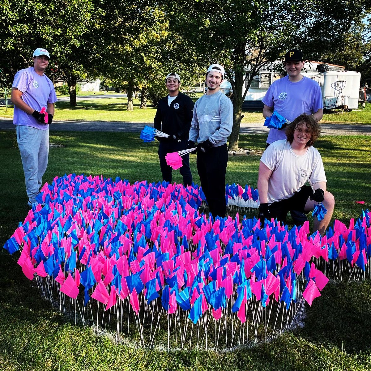Thank you to the amazing gentlemen of <a href="/BGAlphaSigs/">BGSU Alpha Sigma Phi</a> for helping us prepare the SGM yard for this weekend’s Race4Grace and #pregnancyandinfantlossawareness month. Each flag represents one of the over 4,000 babies lost in pregnancy or infancy each month in Ohio. 💗💙👣