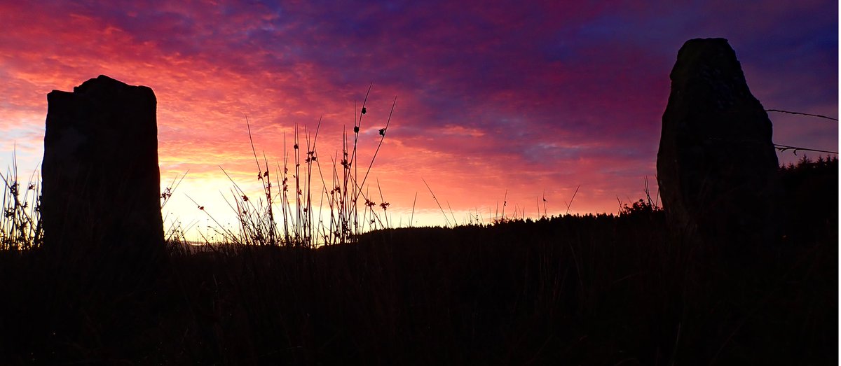 LifeAfloat's tweet photo. I looked out the window to see the promise of an incredible sunrise so I grabbed my camera and ran up to greet the dawn beside the ancient Balliscate standing stones. I’m pleased I did. I hope you enjoy a wonderful day folks. 😊 https://t.co/1J3XHqtu2I