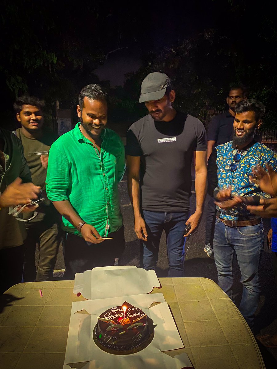 dop_madhan's tweet photo. Thanks for the surprise guys #teamkuriosity late night cake cutting on the sets of #veeramaevaagaisoodum #vishal31 Surprised to receive a token of love from you anna #vishal @VishalKOfficial https://t.co/D07mTLQQTr