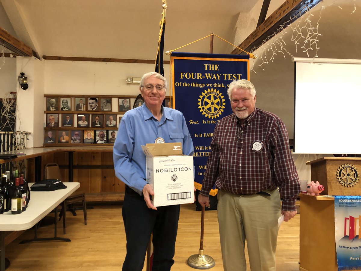 GlacierMusic's tweet photo. GSC board Vice President, Mike Moffitt and GSC's Director of Operations and Development, Ron Osterbauer gifted 6 bottles of wine to Whitefish Rotary's upcoming wine raffle, thanking the club for their support of our Youth Music Experience program.  
       https://t.co/zRW3YL32fU https://t.co/AtkwgMxDLl