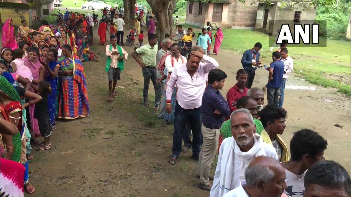 ANI's tweet photo. Bihar: People queue up at a polling booth in Gaya's Tikri and Guraru as they cast their vote in the second phase of panchayat polls in the state today. https://t.co/XtEI5XpGlA