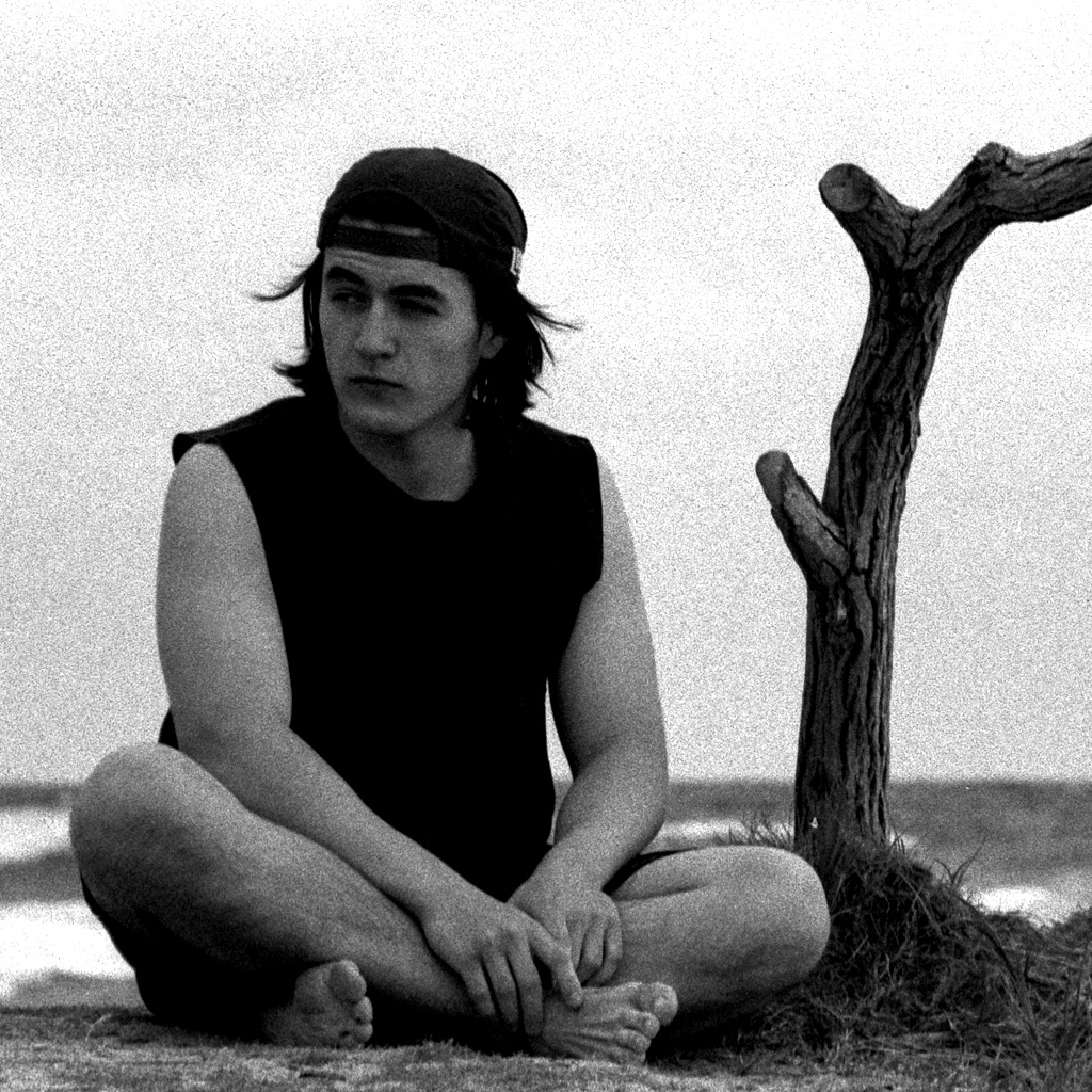 Lex Fridman on X: I used to have long hair. These photos were taken by my  brother many years ago. It's me being silly, having fun, out by the ocean.  Time flies.