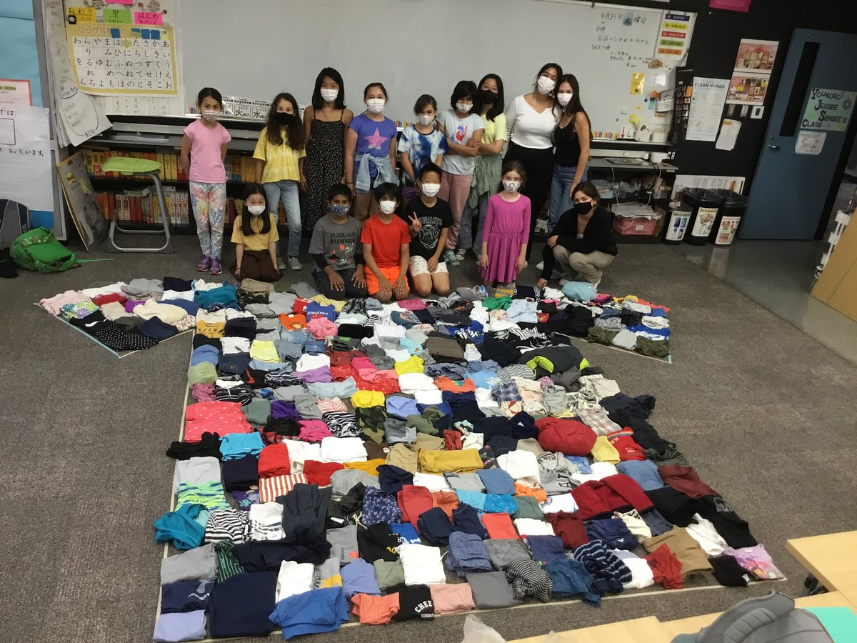 asijJessee's tweet photo. "Fuku-no-chikara" project started now!  Kids' are creating a video, posters, and boxes, checking and packing used kids clothes to send to refugee camps around the world. https://t.co/mJypUpcFSO