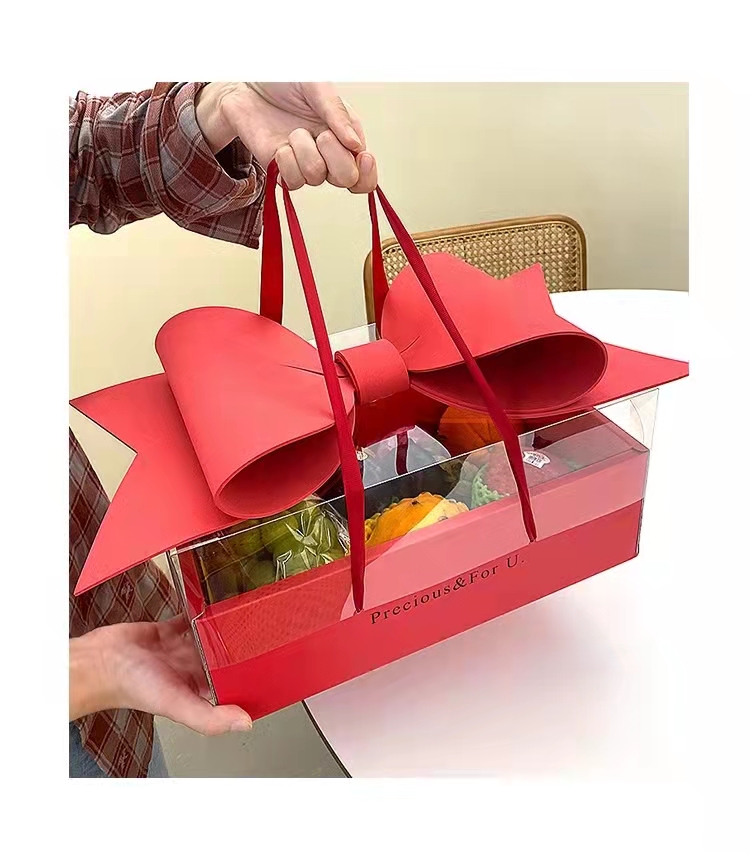 jialanpackage's tweet image. Transparent lid fruit packaging box high-grade portable gift fruit box

Unique red bow design, fashionable and exquisite

Size: 35*21*16.5cm
Color: red
MOQ: 500pcs

Disccover more: good-package.com/?twitter=1

#giftboxeswholesale #fruitpackagingboxmanufacturers #paperboxfactory