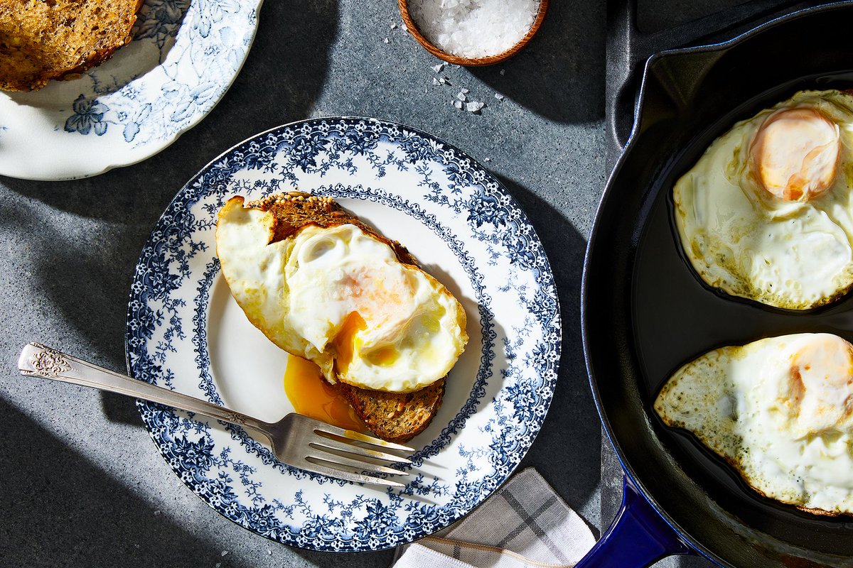 Food52's tweet photo. The crispy fried eggs that made @miglorious a better cook #GeniusRecipes https://t.co/3eWy4QviXh https://t.co/I3SEfjsire
