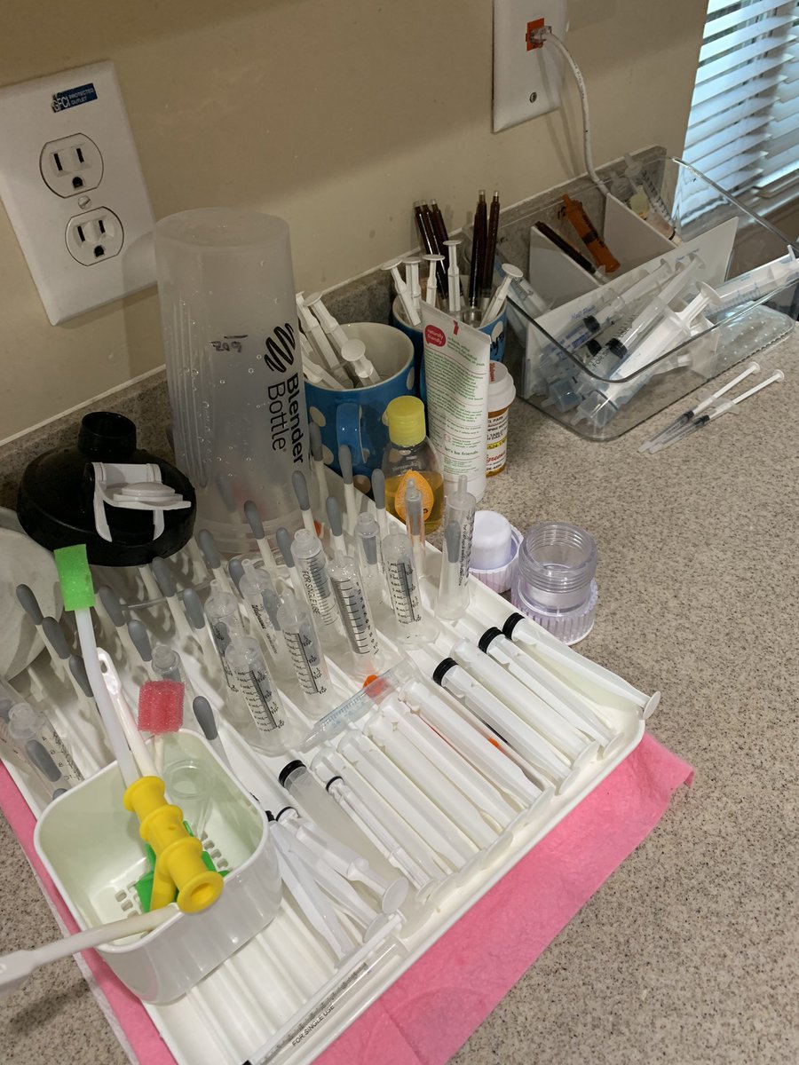 Adapting to special needs life with a giant new eye sore in the kitchen. This drying rack is normally used for baby bottles, but now it’s transitioned to a syringe rack. Life changes really freaking fast. #specialneeds