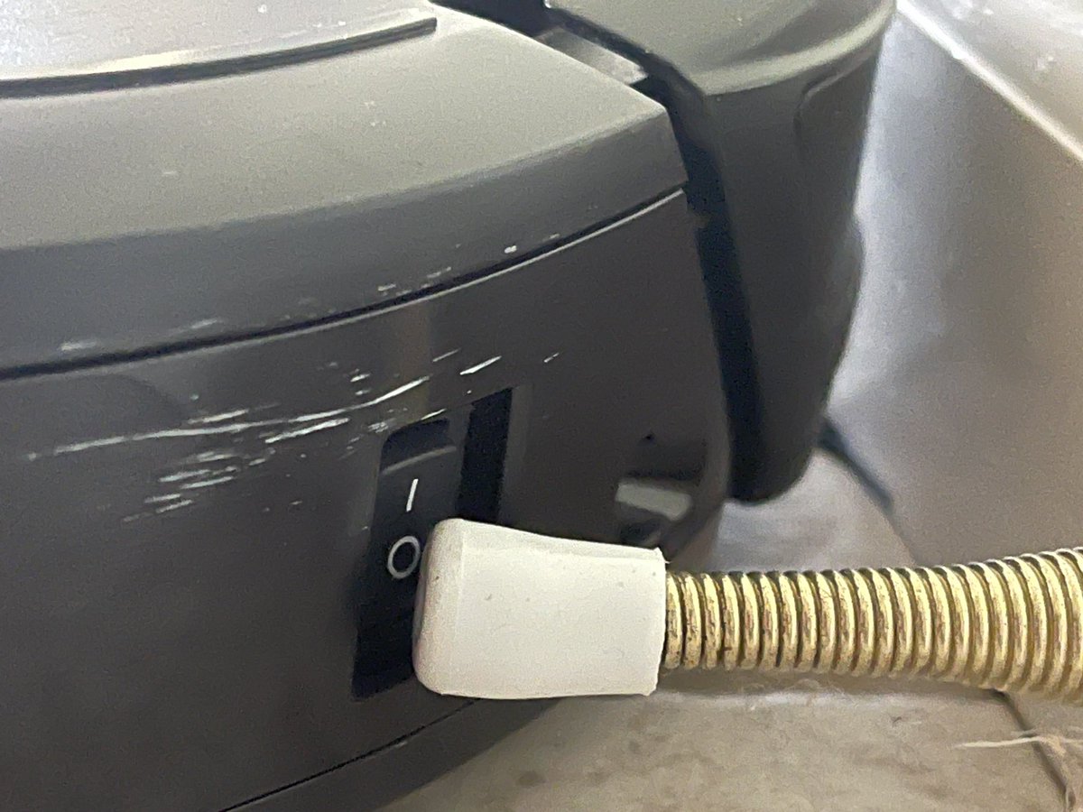 A door stop, perfectly positioned to have flipped the power switch off.