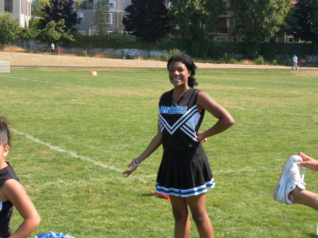 Omarisal's tweet photo. #CDPanthers - My daughter Acacia was a CD Panther Cheerleader. These pictures are from 10 years ago at Judkins Park. We value our children, we value our community. We need to put our values in action and protect and uplift our youth in EVERY neighborhood in the Emerald City. https://t.co/KkkfXF5wIA
