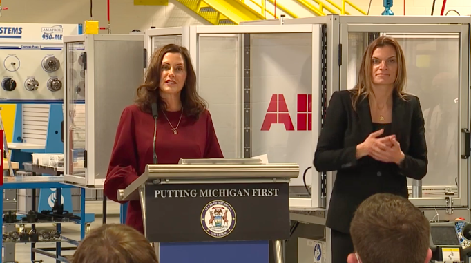 ChadLivengood's tweet photo. At budget signing press conference, @GovWhitmer emphasizing job creation numbers for several line items in the budget, particularly in road and bridge repairs.

She also highlighted Miller Road bridge by the Ford truck plant in Dearborn is getting replaced (emphasis on Ford). https://t.co/DvBcOBfhJt