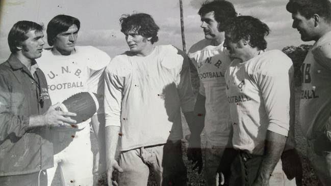 We would like to share this flashback to a 1973 Red Bomber practice. 
Left to right are: Head Coach Jim Born, Steve Gale, Don Davis (currently our QB Coach), Al Norman, Bob Clive and Hugh Fulton. 
#TraditionNeverGraduates
#GoReds
(Photo courtesy Al Norman)