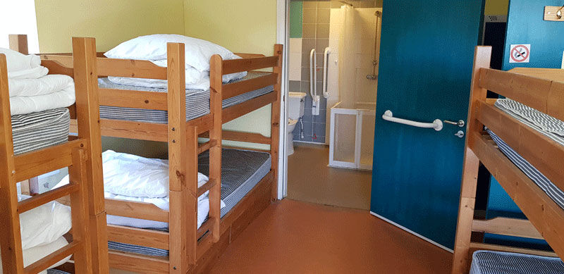 Llys Ednowain group accommodation in Snowdonia has accommodation with an accessible shower room (and lift to accommodation).  Available for stays of 1 night upwards.  Contact us about your specific needs.  cadairviewlodge.co.uk/llys-ednowain-…