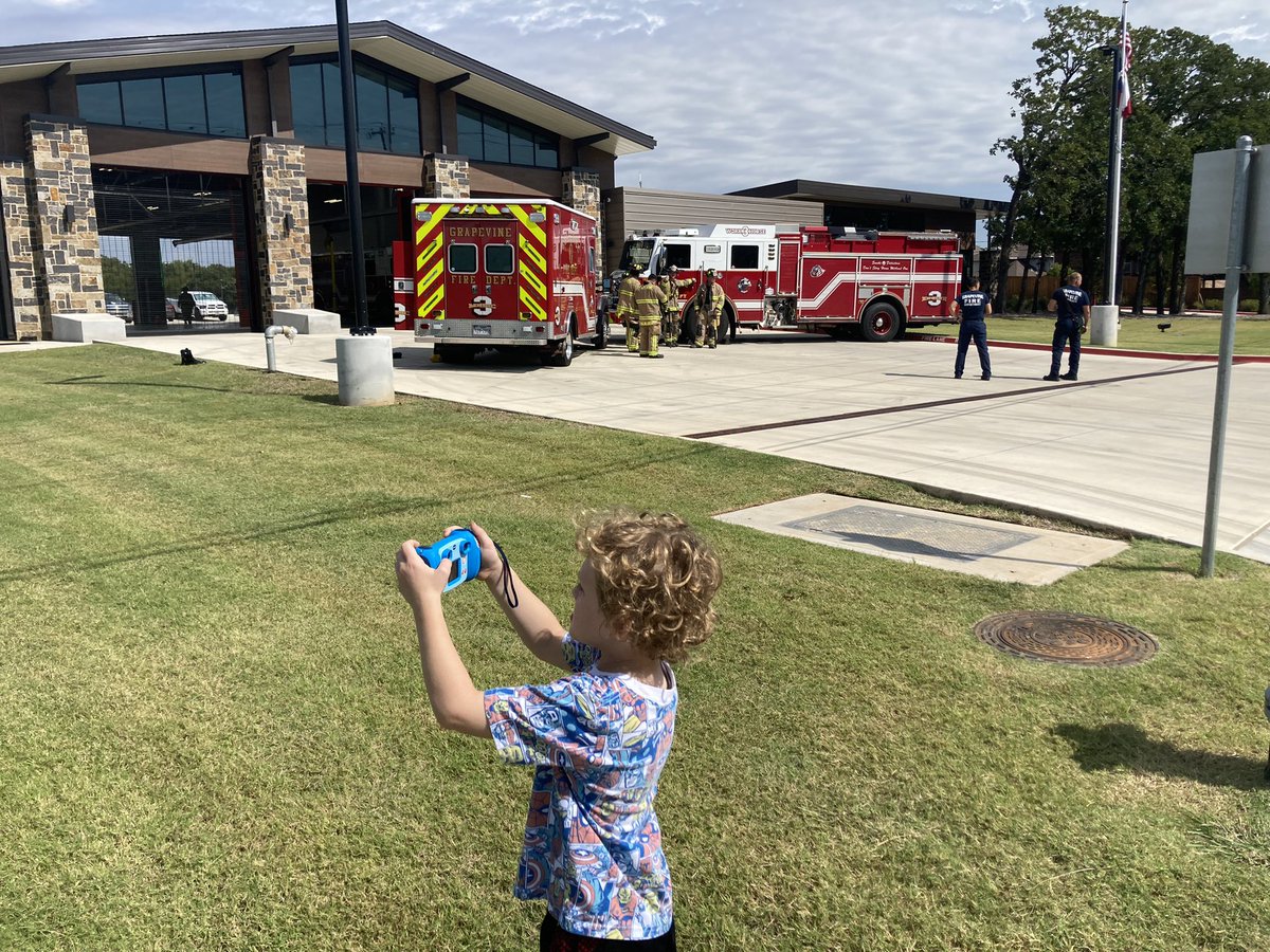shelliecarson's tweet photo. When you take your camera on a walk to pick up brother from school and the @GrapevineFireTX is having a photo shoot, you go from photographer to model. Thanks for making his day! Y’all are the best! https://t.co/B3eGdEzzTx