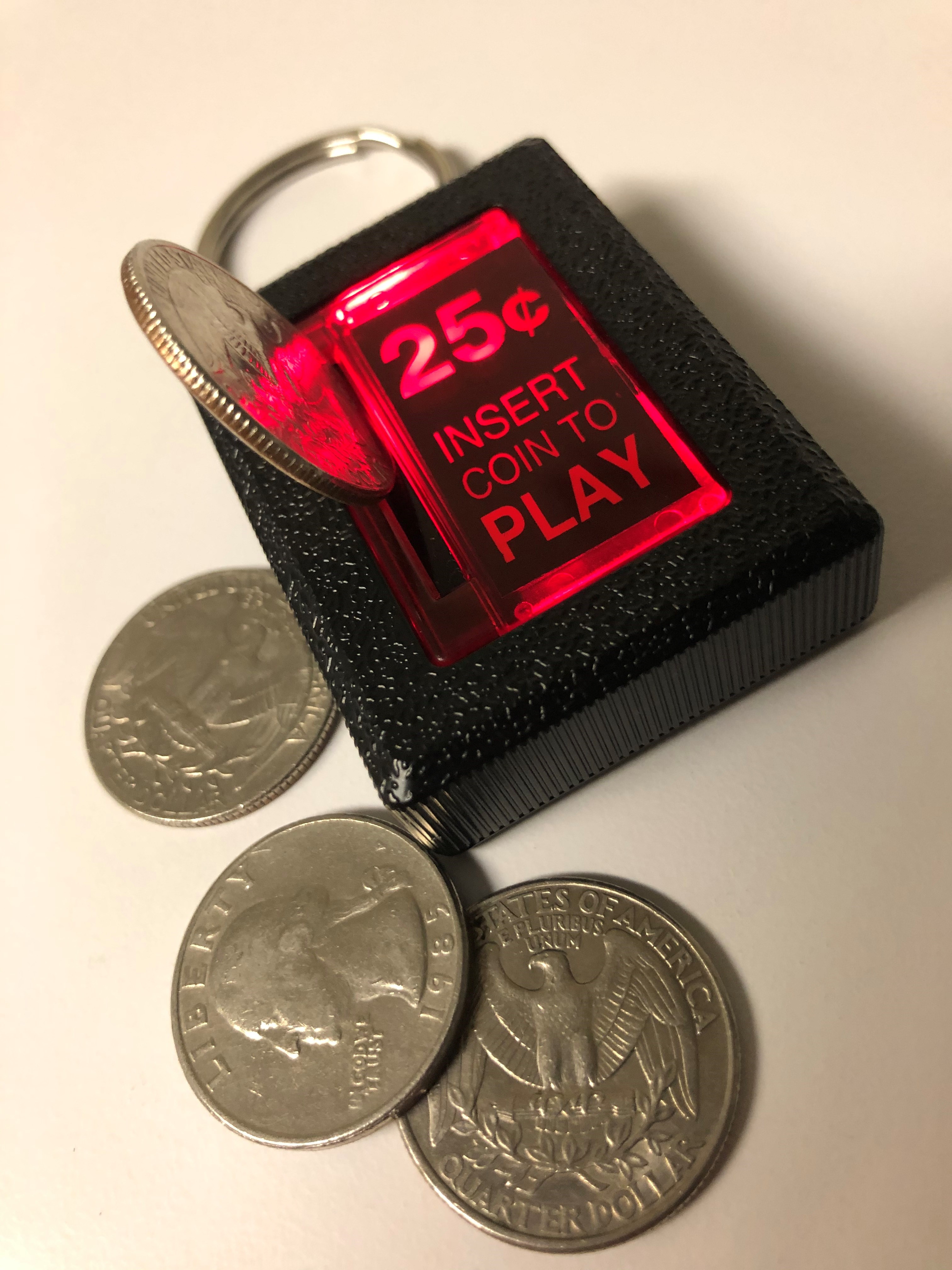New Wave Toys on X The Insert Coin Keychain is back in stock Come check out this arcade accurate 1 1 scale replica coin return button keychain made out of die cast metal