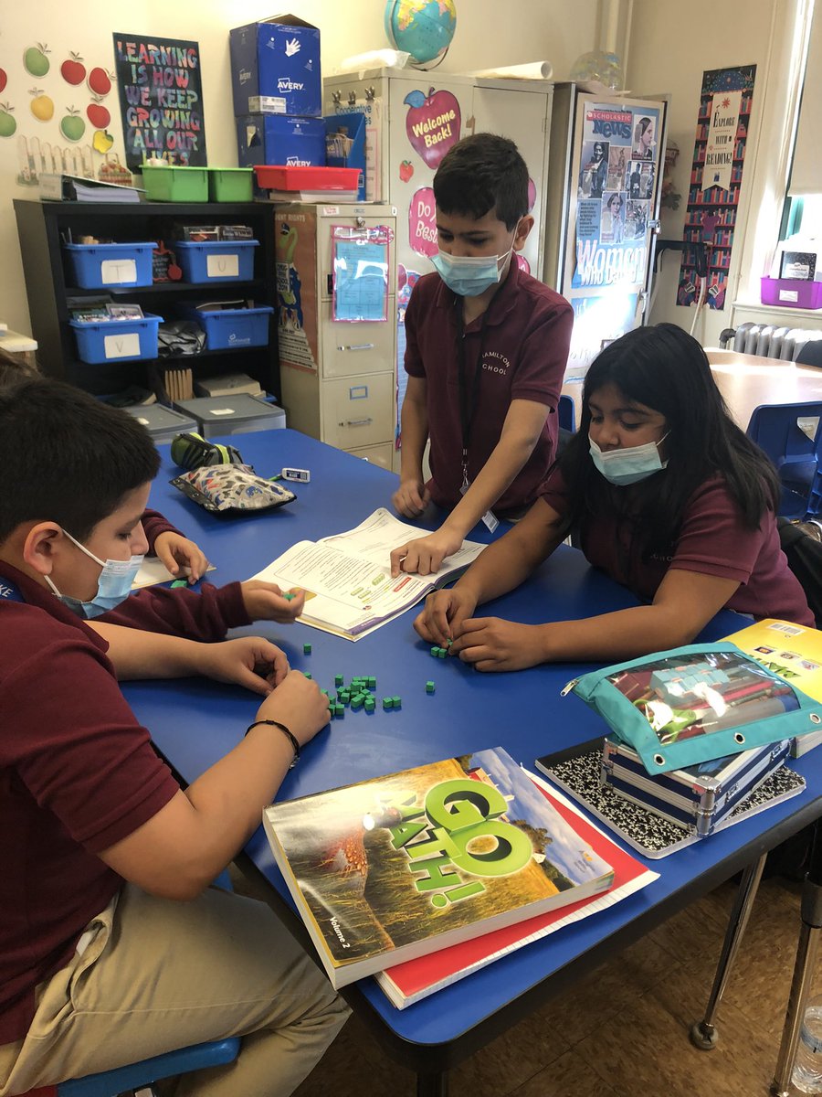 DirenzoMargaret's tweet photo. In Grade 5: Using unit cubes to find the volume of rectangular prisms. #understandvolume #handsonlearning #mathisfun #workingtogether https://t.co/4n5IQhOSfk