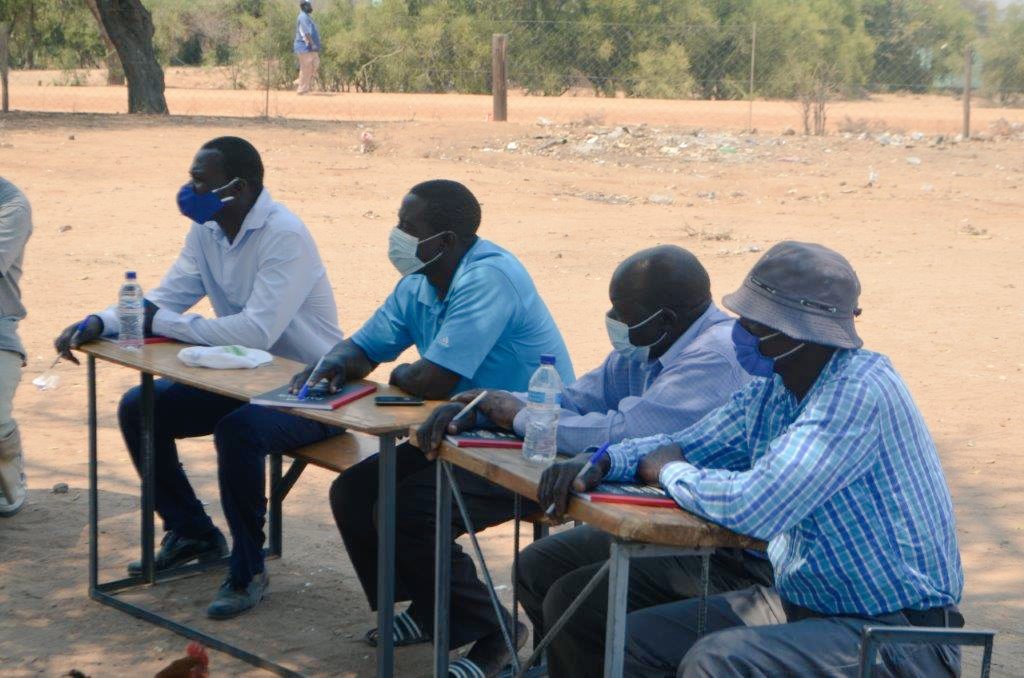 GoalZimbabwe's tweet photo. Male advocates from Mutiusinazita, Buhera discuss their role in building harmonious households and communities. #JointDecisionMaking #StopGBV #NoToChildMarriages @Irish_Aid #GardenTrust https://t.co/2ipET1h3Pf