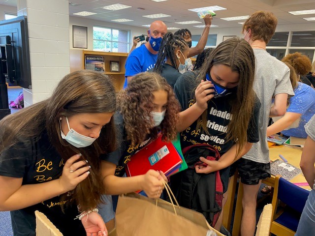 LGMS_HCS's tweet image. The LGMS Jr Beta Club officers partnered with the LGHS Student Government and members of our elementary school clusters to sort school supplies and pack back packs.  Thank you to @HomeDepot for donating the supplies to support our students! #BetterTogether #LeadThroughService