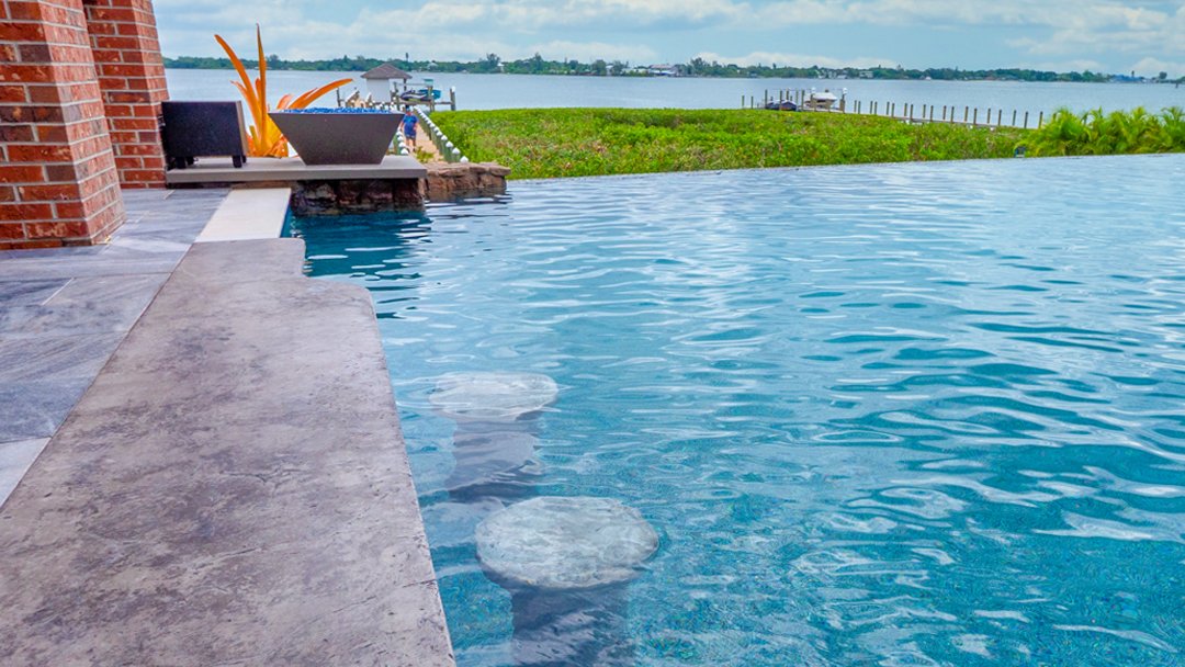 Would your #ultimatebackyard have a swim-up bar and an infinity-edge pool?

#insanepools #lucaslagoons #infinityedgepool #swimupbar