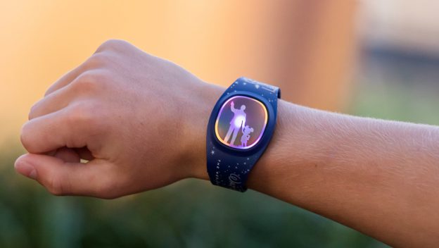 WaltDisneyWorld's tweet photo. JUST ANNOUNCED: MagicBand+ will debut in 2022 at #WaltDisneyWorld Resort as part of the 50th Anniversary Celebration and will help immerse you in Disney stories and connect with characters you love like never before. Get details: https://t.co/IExHRGkJ70 #DisneyWorld50 https://t.co/SKTbo3RrGB