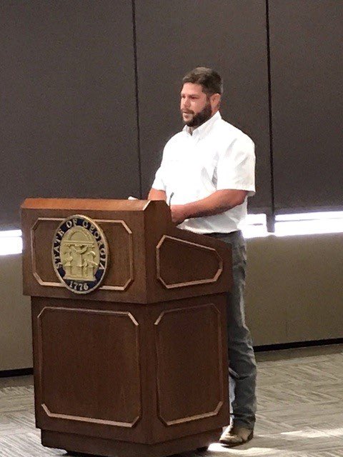 GeorgiaCTAE's tweet photo. John McFarland, Colquitt County HS, and Tim Hobbs, CTAE Director - Colquitt County Schools, present Construction Technology project to State Board of Education. The project builds beds for foster children to take with them wherever they live. #CTAEDelivers @CCHSPackers https://t.co/h6l7rEGQYy