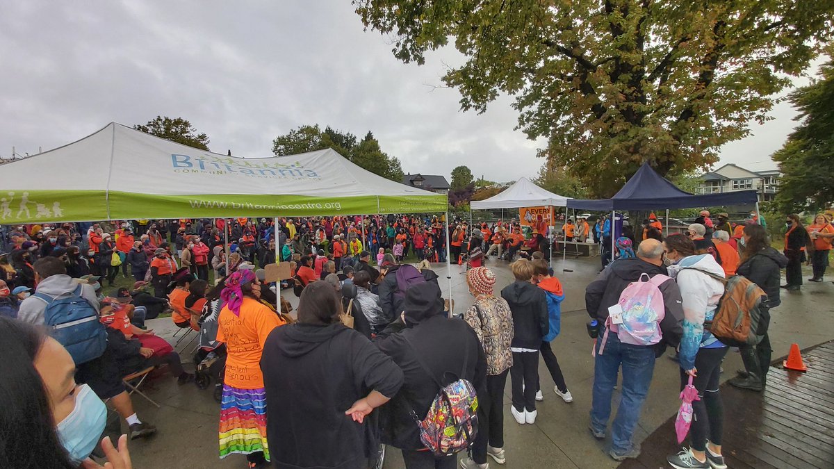 At Grandview Park in Vancouver to honour #OrangeShirtDay2021 .  A large contingent of people/ supporters and Residential School survivors walked from the Friendship Centre to Grandview Park..  Survivors are telling their stories, they are strong, resilient and powerful.