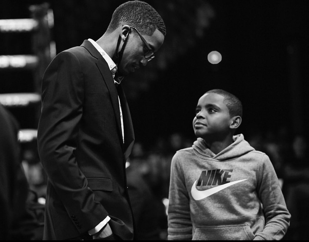 Lending an ear to the youngin.