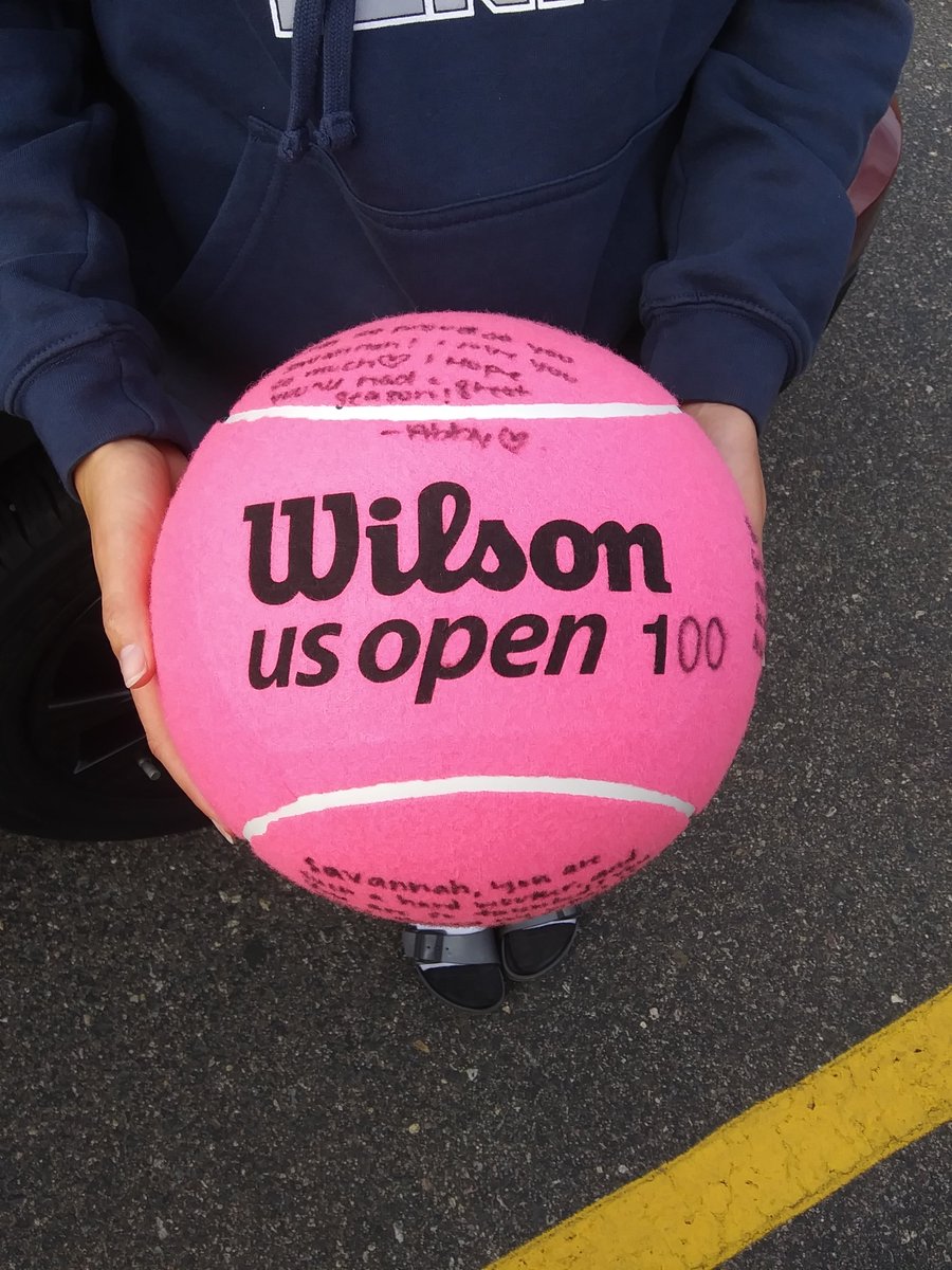 Savannah Haugen won her 100th varsity match for Bemidji High School yesterday against Brainerd. Today, her teammates presented her with a giant ball commemorating the occasion. Oh, and she picked up wins 101 and 102. Not a bad day at the office. @BemidjiTennis