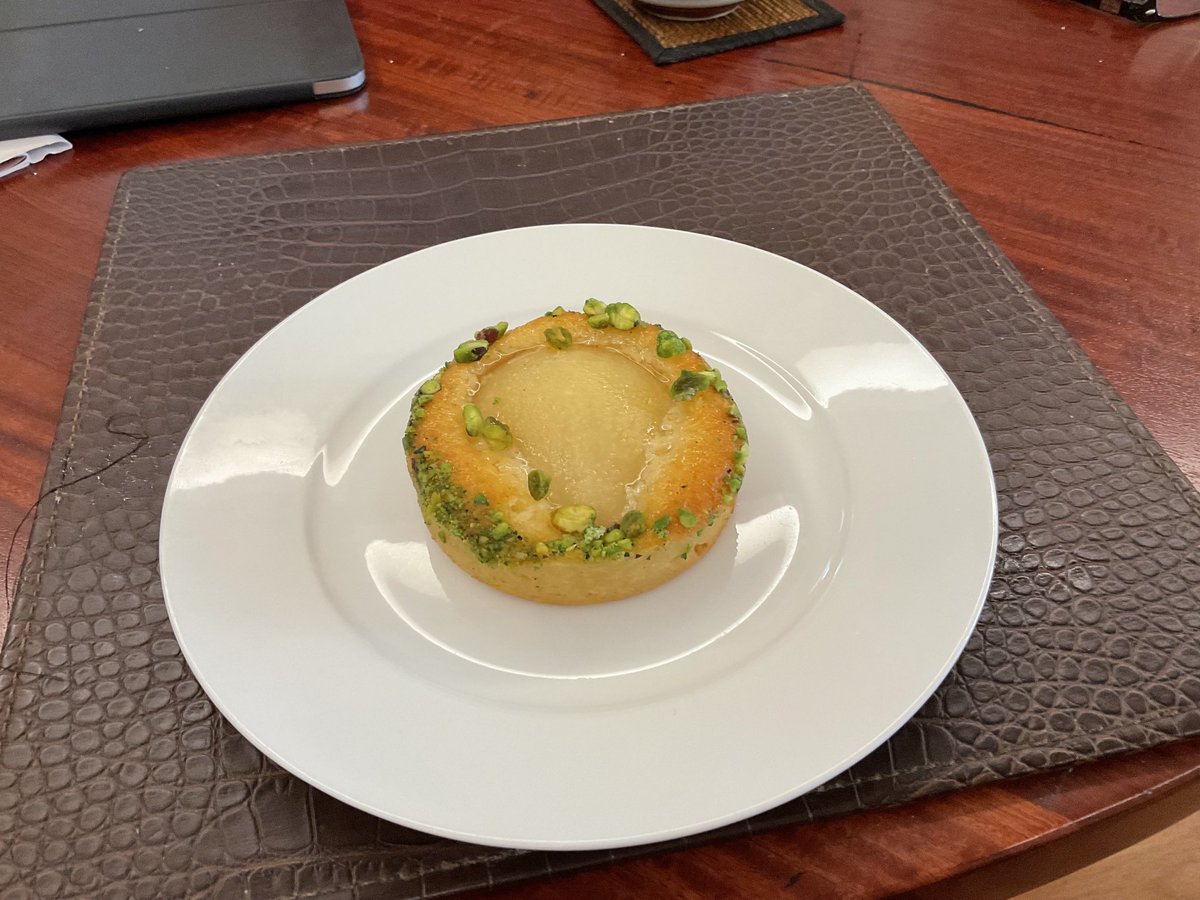 oldlillipilli's tweet photo. On a day when people in NSW are contemplating an Opus Dei takeover of government policy there is comfort in eating a pear & almond tart with pistachio garnish as a #lockdowncake from Strawberry Fields Patisserie https://t.co/GXWsXuDr4K