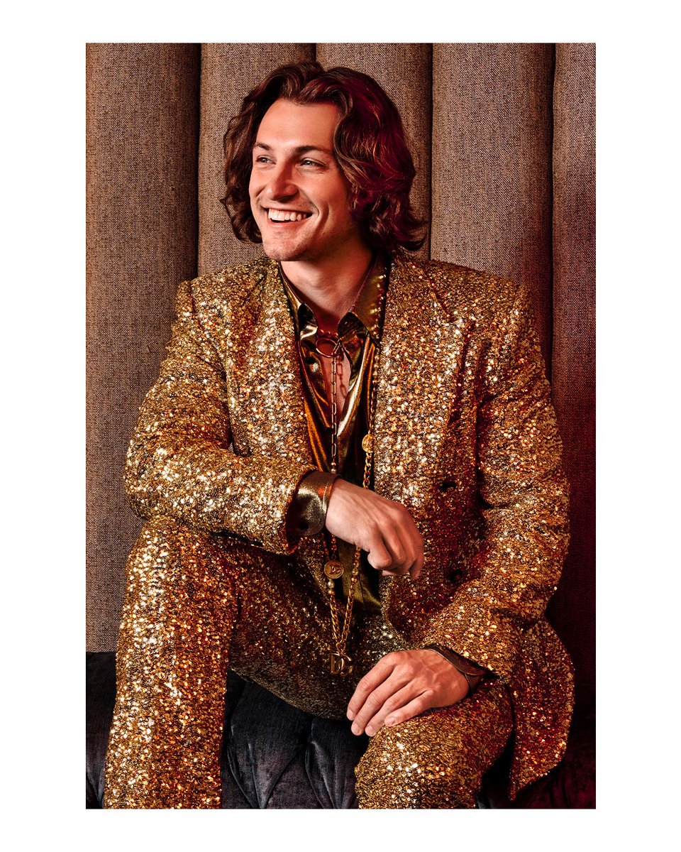 dolcegabbana's tweet photo. An essential and refined look captured by #DavidMiller, featuring a gold double-breasted #DolceGabbana sequined suit paired with a silk shirt. 
#DGTogether https://t.co/ZBXatqoxDG