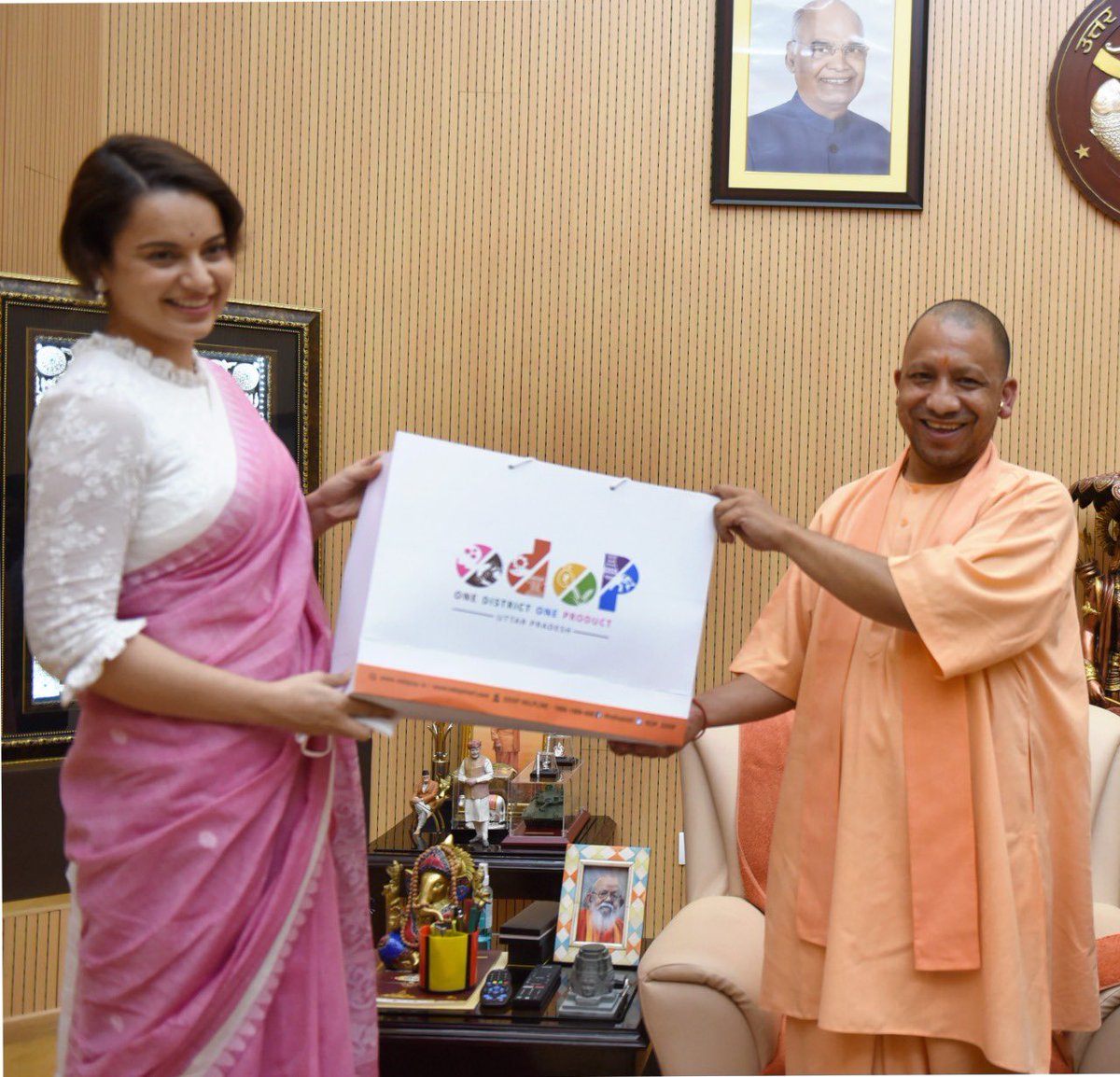Famous Actress Kangana Ranawat met <a href="/myogiadityanath/">Yogi Adityanath</a> Hon’ble Chief Minister UP, who presented her with an <a href="/UP_ODOP/">ODOP (One District One Product)</a> product. Kangna ji will be our Brand Ambassador for ODOP <a href="/CMOfficeUP/">CM Office, GoUP</a>