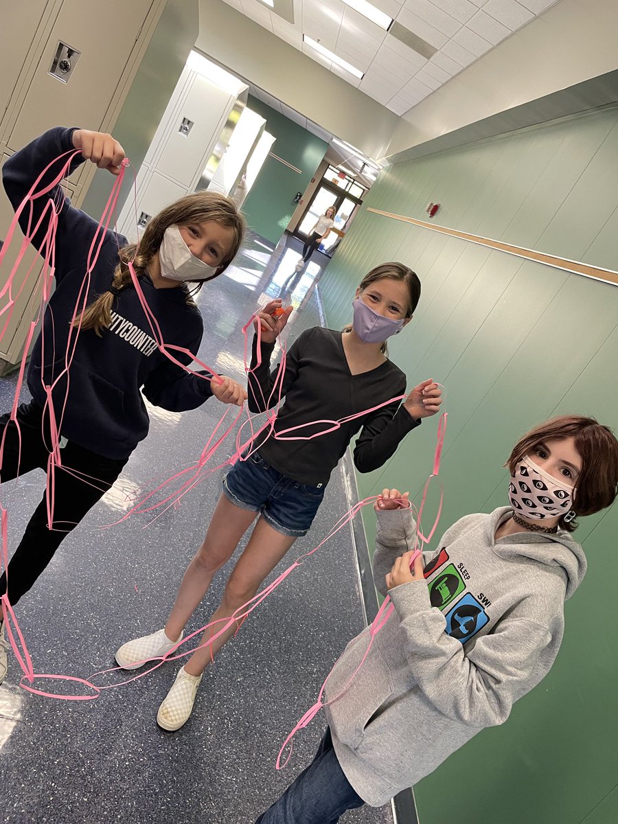 MrsRobinsonGMS's tweet photo. Today’s STEM challenge had kids working together to create the longest paper chain they with only one piece of paper! The pink group made a chain 1,045cm long! Way to go girls! #stemchallengefriday @gmsDCSD https://t.co/TcIYJk7ZkR