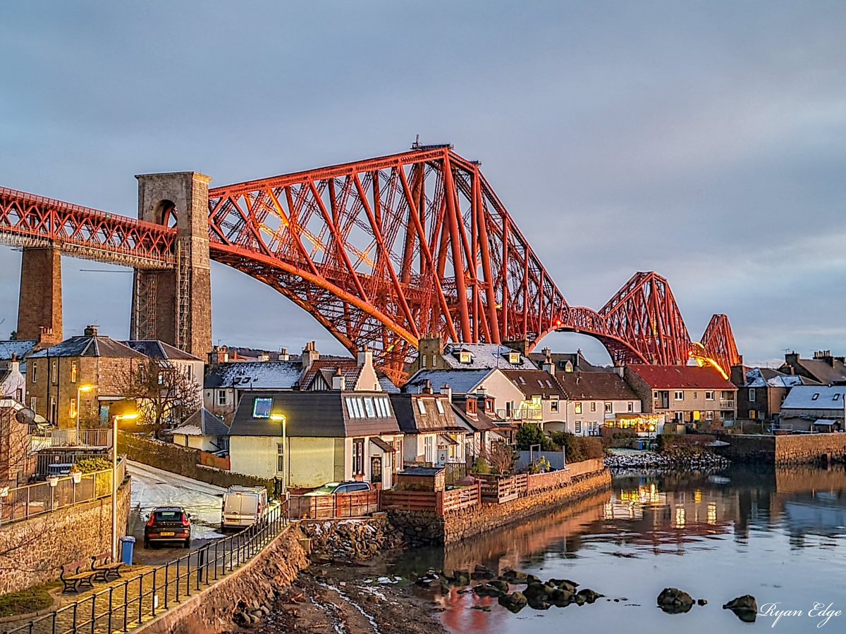 The Forth Bridge towers over North Queensferry at sunset. 

<a href="/NetworkRailSCOT/">Network Rail Scotland</a> <a href="/VisitScotland/">VisitScotland</a> <a href="/welcometofife/">Welcome to Fife</a> <a href="/TheForthBridges/">The Forth Bridges</a>