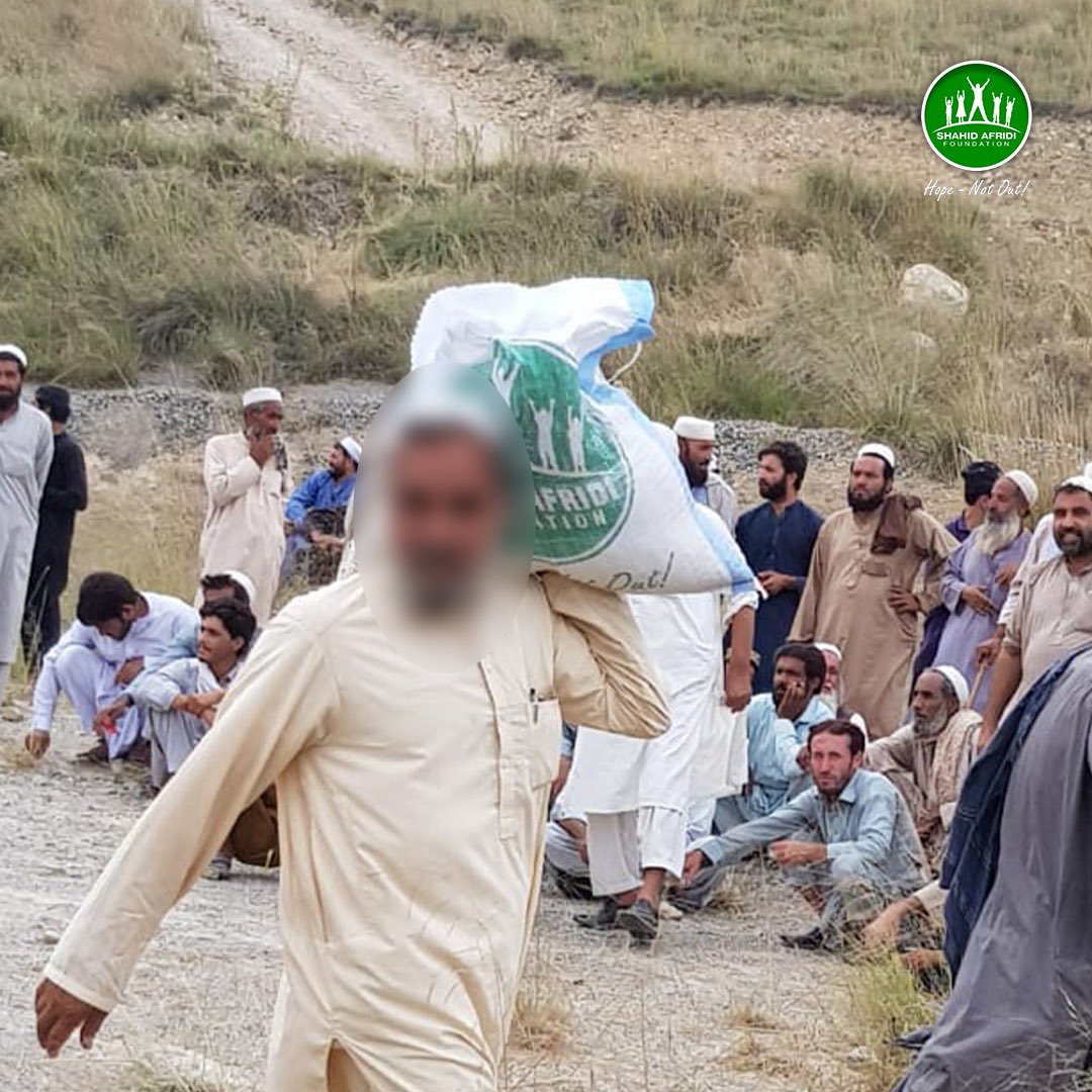 SAfridiOfficial's tweet photo. Glad to have returned to my roots in Tirah Valley. This is my home &amp; I couldn't be happier to give back to people with the @SAFoundationN Ration Drive in Toor Dara with support of #PakArmy. We provided food supplies to help destitute communities combat food scarcity. #HopeNotOut! https://t.co/t8fpzHarOA