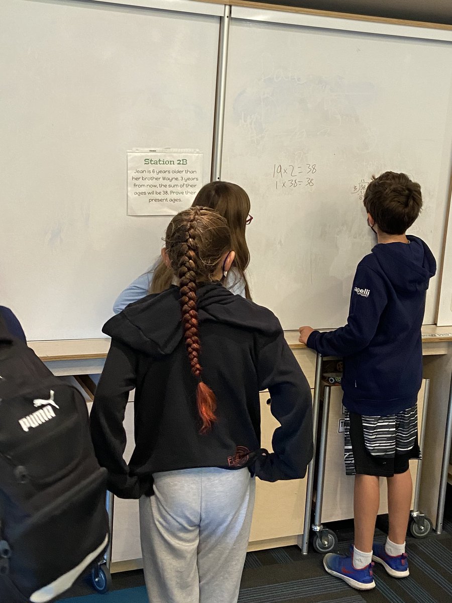 STEAMwithSasso's tweet photo. I came in today nice and early to set up my 8th grade enrichment stations. Few minutes later, my 5th grade homeroom was at the whiteboard trying to solve! Literally- the best way to start the day! #WeAreChappaqua #REBellTone #MiniMathmaticians https://t.co/AO5X5Z1R7N