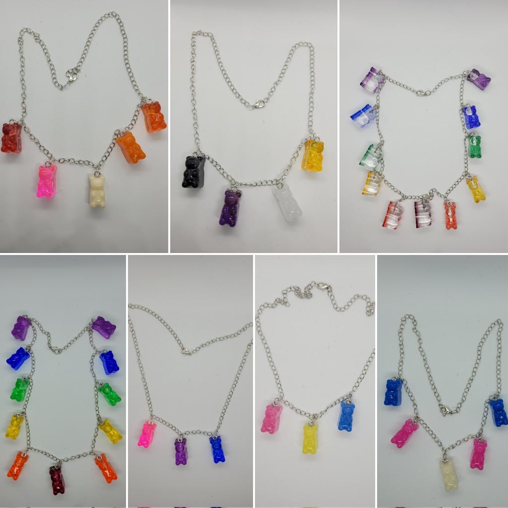 Arson_Craft's tweet photo. I am a proud non-binary artist and in honor of Nation Coming Out day I created these gummy bear necklaces inspired by LGBTQ+ flags. Visit https://t.co/1X50F8TMR2 &amp; check them out. 

#etsyshop #SupportSmallBusiness #pride #love #lovewhoyoulove #showyourpride #comingout #loveislove https://t.co/g9lNKzLbTk
