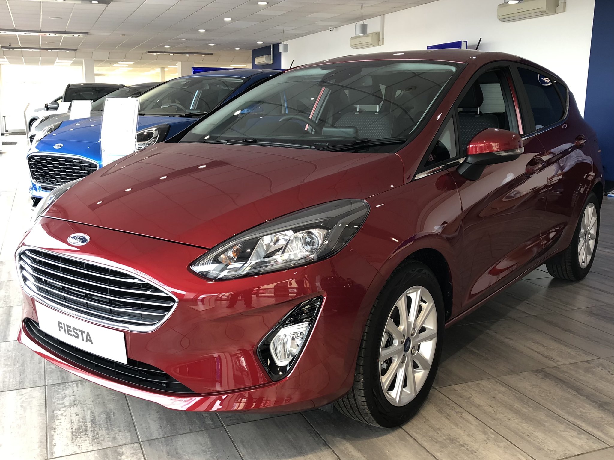 Ford on Twitter: "We now have this beautiful Ruby Red Fiesta Titanium MHEV in our showroom! If you're in the market for a New Fiesta right now, this one has to
