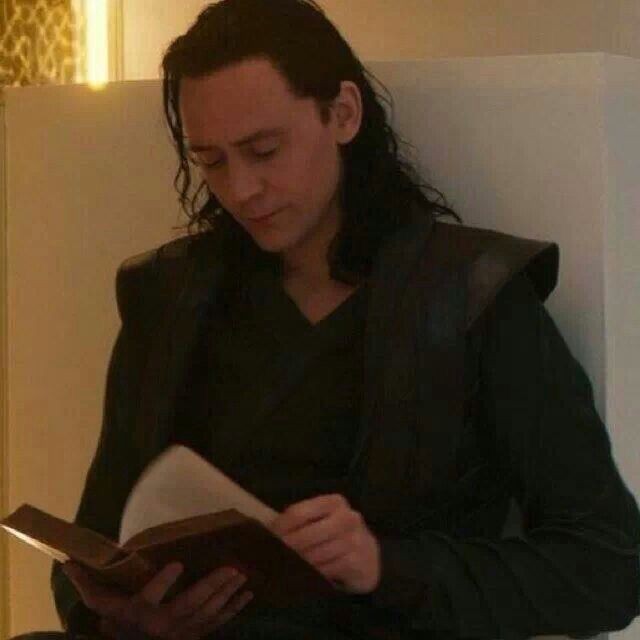 He is reading in peace