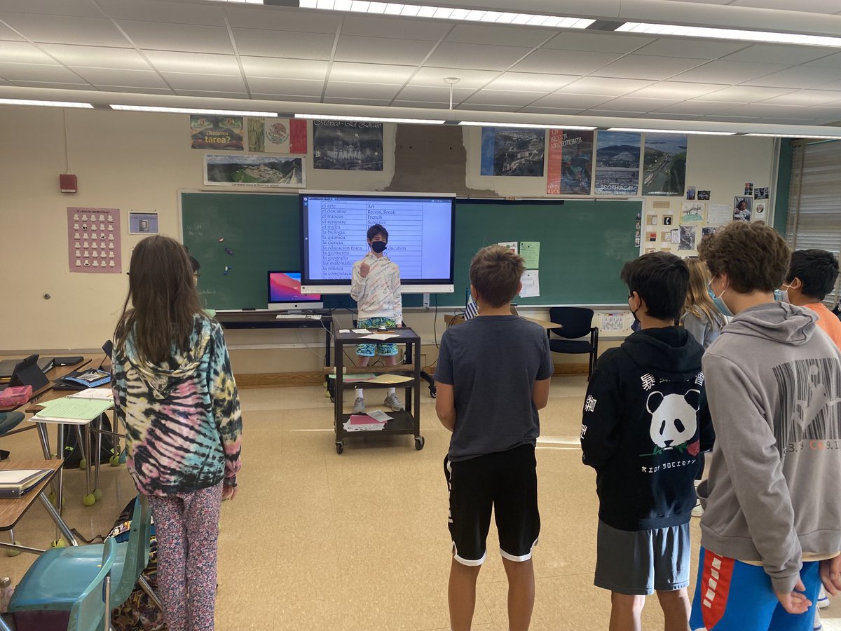 srstevejackson's tweet photo. A student leading the class in bicep curls while repeating “¡la educación física!”    Also, one of the most unique “palabras del día” (“words of the day”) we’ve had this year!
 #scarsdalewl #scarsdalemspride https://t.co/Qt2VOk3rbC