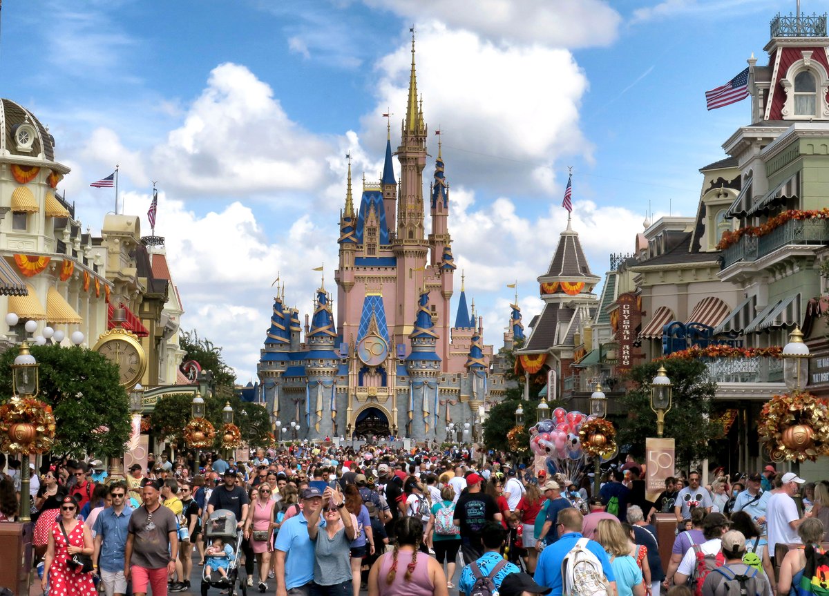 OSPhoto's tweet photo. Crowds fill Main Street USA in front of Cinderella Castle at the Magic Kingdom on the 50th anniversary of Walt Disney World, Friday, Oct. 1, 2021. (Joe Burbank/Orlando Sentinel) @orlandosentinel @joeburb #orlandosentinel #disneyworld50 #disneyworld #waltdisneyworld #MagicKingdom https://t.co/fq4bTkgZoH